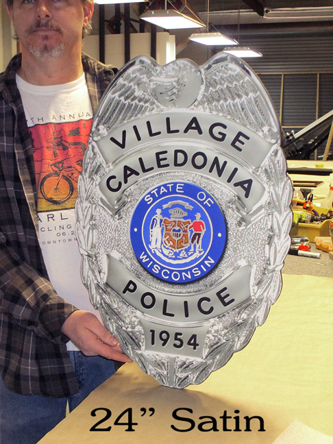 Caledonia PD Badge