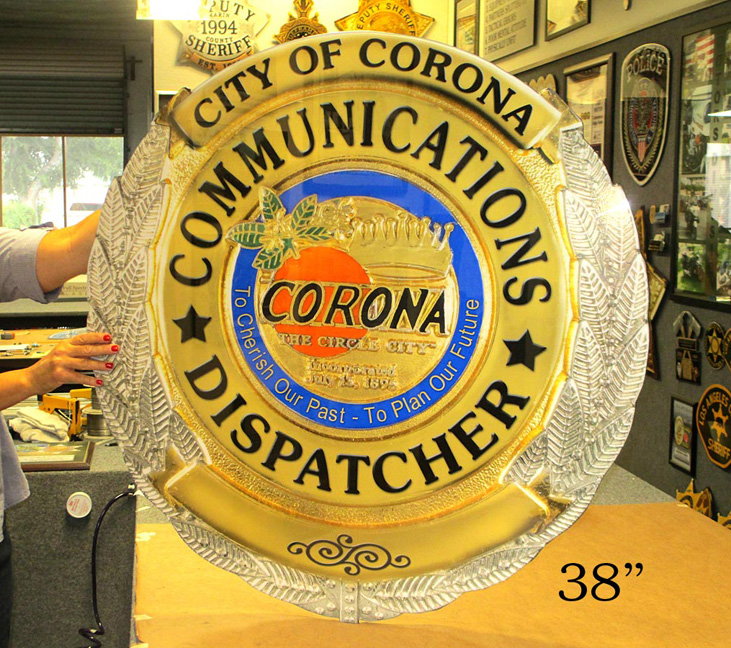 Corona Communications
                Oversize Badge