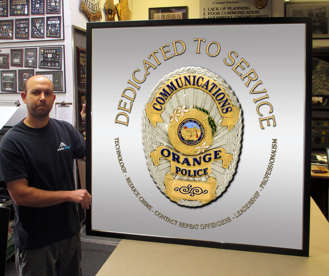 Police Communications sign from Badge Frame framed in Black Leather