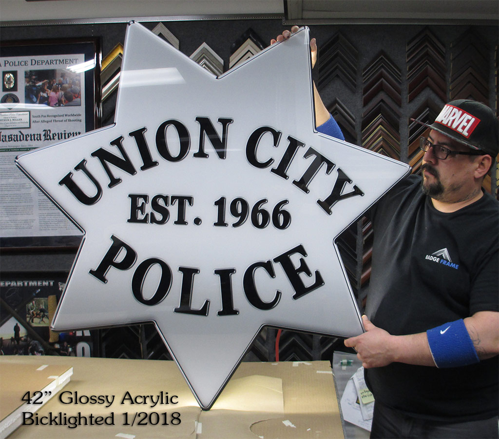 Union City PD - Oversize, backlighted, glossy acrylic badge from Badge Frame